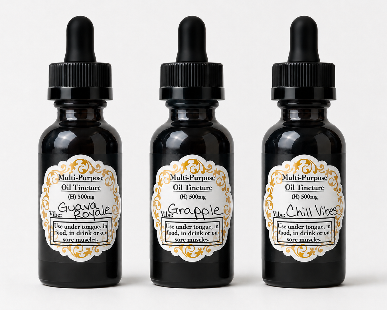 Three black oil bottles with droppers on a white background